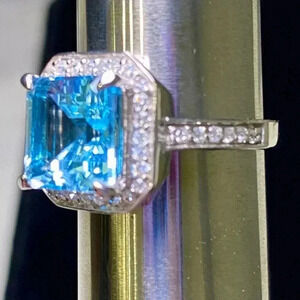 Blue Topaz gemstone with CZ accents set in .925 Sterling Silver ring